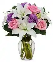 pink roses, purple carnations and white lilies