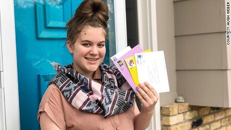 11-year-old Emerson Weber is using her passion for letter writing to brighten up essential postal workers day.