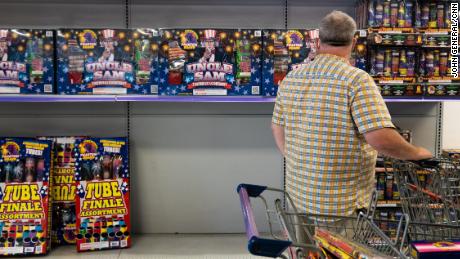 A customer shops for fireworks at a Phantom Fireworks store in Easton, PA. The company says the coronavirus pandemic has led to record-breaking sales and short inventory ahead of July 4th.